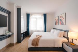 Voodi või voodid majutusasutuse Nature Hotel Da Lat - Le Dai Hanh toas