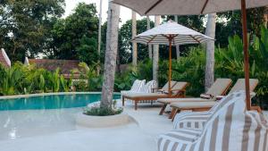Bazén v ubytování Loku Kedungu - Boutique Resort nebo v jeho okolí