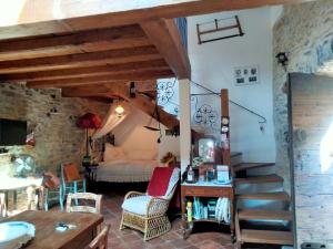 a living room with a staircase leading to a bedroom at A fenera in Dolcedo