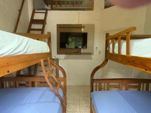 Postel nebo postele na pokoji v ubytování La Cabaña de Victor