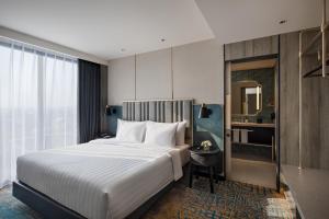 Katil atau katil-katil dalam bilik di Mercure Madiun
