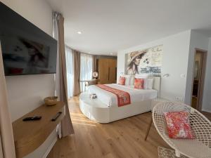 Postel nebo postele na pokoji v ubytování APATOA Beach & Garden Village