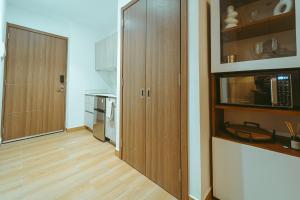 Η κουζίνα ή μικρή κουζίνα στο Downtown Punta Cana Central Park 1 BR First Floor A-103