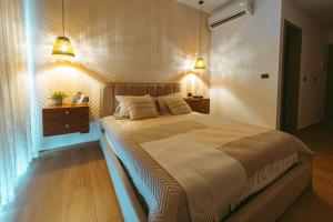 Ένα ή περισσότερα κρεβάτια σε δωμάτιο στο Downtown Punta Cana Central Park 1 BR First Floor A-103 +9 φωτογραφίες