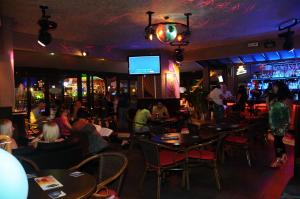 a group of people sitting in a bar at Hisar Holiday Club in Oludeniz +35 photos