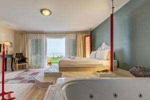 Postel nebo postele na pokoji v ubytování Villa Kore Çeşme + 28 fotografií