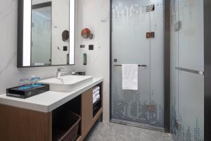 Un baño de 北京传媒大学希尔顿欢朋酒店Hampton by Hilton Beijing Communication University