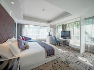 Μια τηλεόραση ή/και κέντρο ψυχαγωγίας στο Wuyang Holiday Hotel Hangzhou