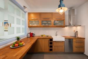Kuchyň nebo kuchyňský kout v ubytování Island View House + 37 fotografií