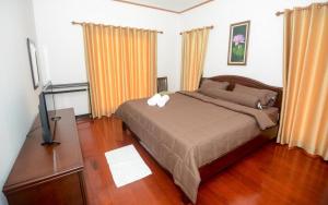 Postel nebo postele na pokoji v ubytování Nangrong garden home + 109 fotografií
