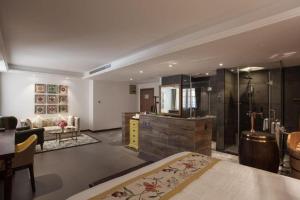 a large room with a bathroom and a living room at Qiandao Lake CBS Beer Spa Hotel in Thousand Island Lake +257 photos