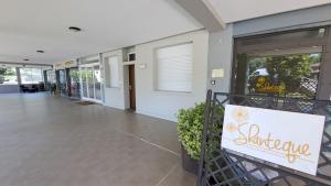 a building with a sign in front of a store at L' Amabile Volpe - Via Carlo Levi 2&2 in Pianoro