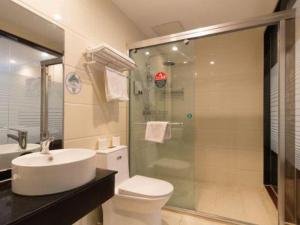Ένα μπάνιο στο GreenTree Inn Wuhu Fangte Second Phase Nanxiang Wanshang Express Hotel +37 φωτογραφίες