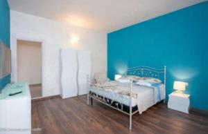 Postel nebo postele na pokoji v ubytování LA SIESTA B&B + 4 fotografie
