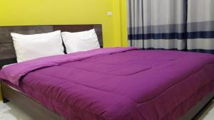 Postel nebo postele na pokoji v ubytování Nam Khong Tara Resort