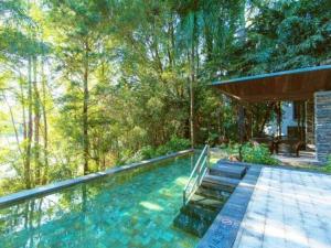 Bazén v ubytování The Mulian Urban Resort Hotels Huadu nebo v jeho okolí