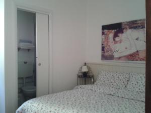 Postel nebo postele na pokoji v ubytování B&B Bondi