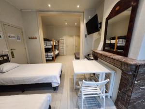A bed or beds in a room at Albert - Rooms