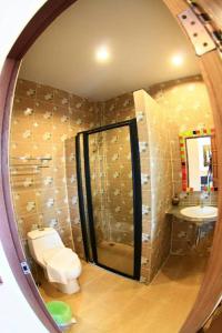 Koupelna v ubytování Banana Resort & Spa