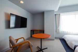 TV a/nebo společenská místnost v ubytování Hotel Global View Tsuchiura