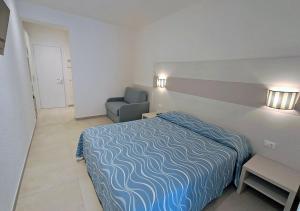 Voodi või voodid majutusasutuse Hotel Crystal toas