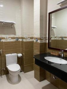 Salle de bains dans l'établissement Sao Mai Phu My Resort