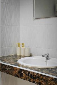 Koupelna v ubytování Rimnam Hotel Suk Sawat 70