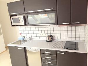 Kuchyň nebo kuchyňský kout v ubytování Apartmány Vojta