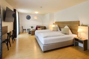 Postel nebo postele na pokoji v ubytování Europahaus Wien + 37 fotografií