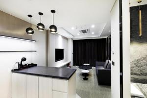 Χώρος καθιστικού στο Gloucester Hotel Kintex