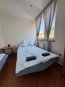 Postel nebo postele na pokoji v ubytování Pensjonat Lemon