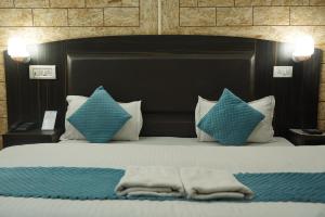 Letto o letti in una camera di Hotel Auli D