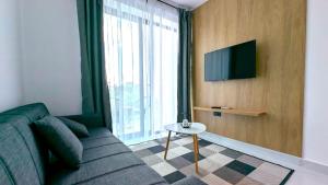 Μια τηλεόραση ή/και κέντρο ψυχαγωγίας στο Cherry Apartment