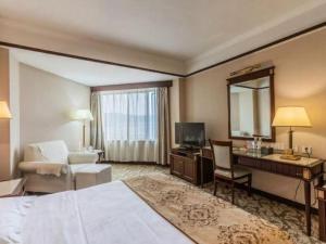 Postel nebo postele na pokoji v ubytování Chengde Yunshan Hotel + 187 fotografií