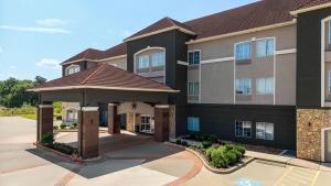 a rendering of a building with a gazebo at La Quinta by Wyndham Brookshire West Katy in Brookshire