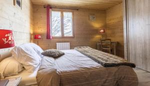 Chalet le Névé客房内的一张或多张床位