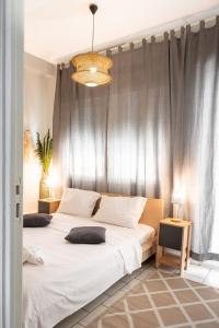 Ένα ή περισσότερα κρεβάτια σε δωμάτιο στο Dolce Vita Luxury Suite Larisa 2nd Floor
