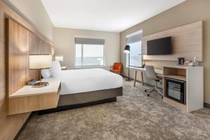 Ένα ή περισσότερα κρεβάτια σε δωμάτιο στο Radisson Hotel Pendleton Airport