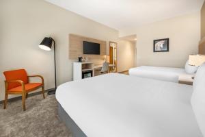 Ένα ή περισσότερα κρεβάτια σε δωμάτιο στο Radisson Hotel Pendleton Airport