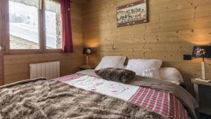 Chalet le Névé客房内的一张或多张床位