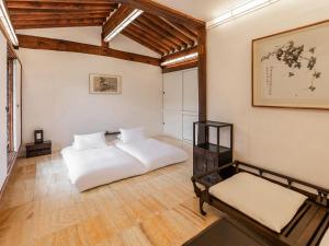 Postel nebo postele na pokoji v ubytování Rakkojae Hahoe Hanok Hotel + 37 fotografií