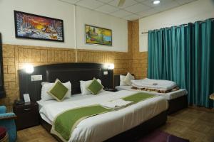 Letto o letti in una camera di Hotel Auli D