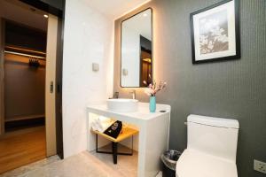 Koupelna v ubytování Magnotel Huludao Xingcheng Central Square Wenquan Street + 96 fotografií