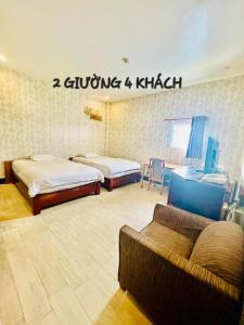 Giường trong phòng chung tại RUBY HOTEL