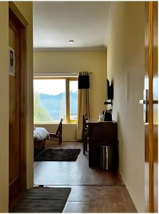 Ένα ή περισσότερα κρεβάτια σε δωμάτιο στο Sixteen Arahat guest house