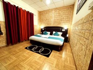 Letto o letti in una camera di Hotel Auli D