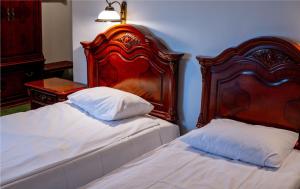 Postel nebo postele na pokoji v ubytování Hotel Górski