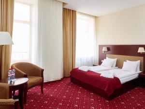 Postel nebo postele na pokoji v ubytování Rixwell Old Riga Palace Hotel