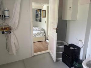 Koupelna v ubytování Troldehuset + 37 fotografií