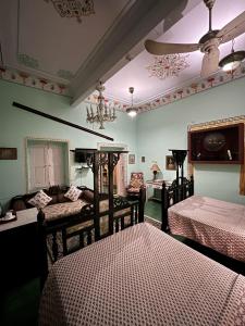 Postel nebo postele na pokoji v ubytování Hotel Bissau Palace